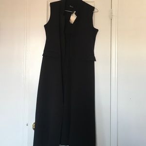 Black unlined sleeveless blazer vest